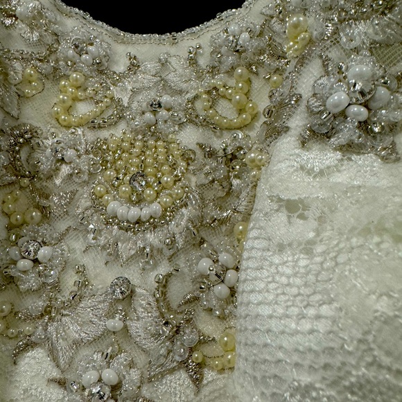 Stunning Mermaid Wedding Dress with Pearl and Bead Embellishments - Picture 6 of 11